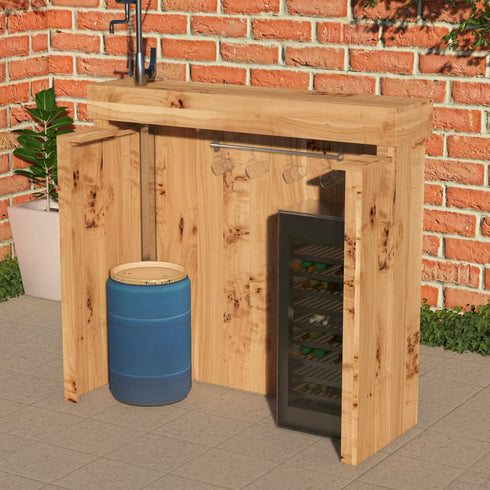 Wooden outdoor bar with a wine cooler against a brick wall.