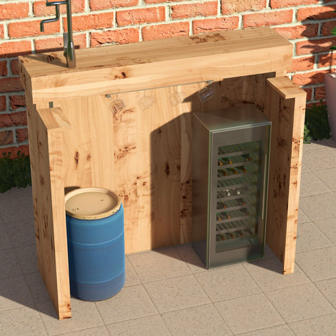 Wooden outdoor kitchen setup with a blue barrel and metal cabinet against a brick wall.