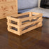 Wooden crate on a wooden floor with a blurred background