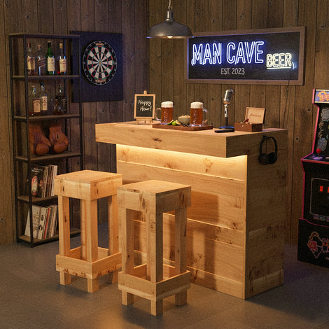 Man cave with wooden bar, stools, dartboard, and neon sign.