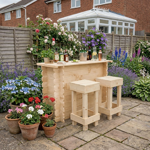 Wooden outdoor bar set with stools in a garden setting